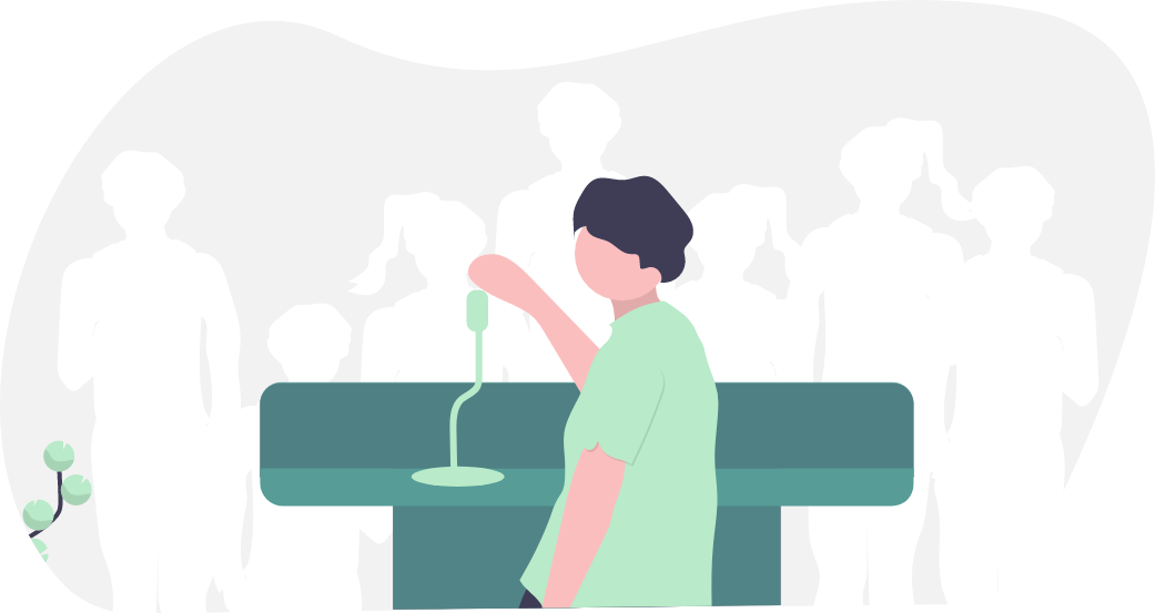 Person speaking from a podium to an audience